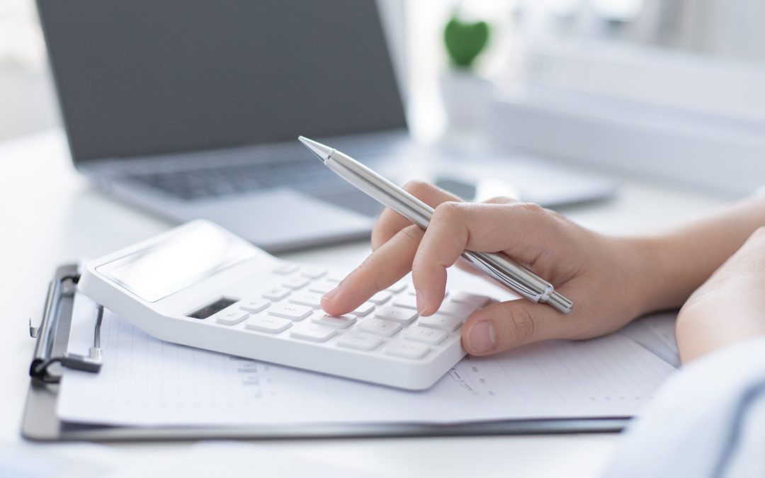 Accounting businesswomen are calculating income-expenditure and analyzing real estate investment data, Dedicated to the progress and growth of the company, Financial and tax systems concept.